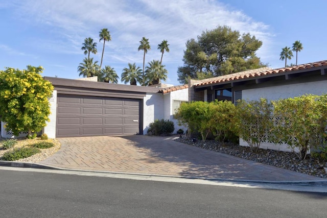 view of front of home with a garage