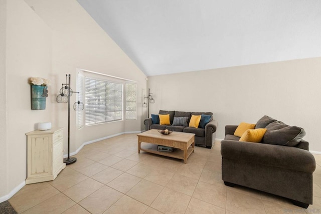 tiled living room with high vaulted ceiling