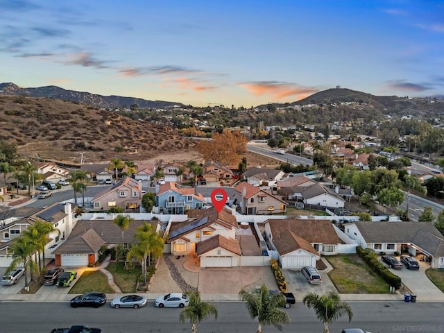 aerial view at dusk with a mountain view