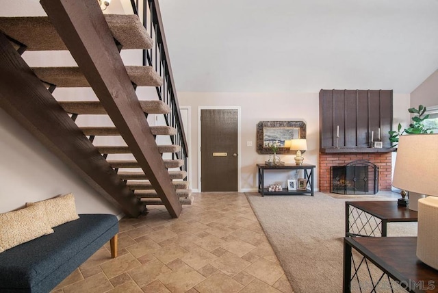 living room featuring a fireplace