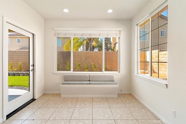 entryway featuring light tile patterned floors