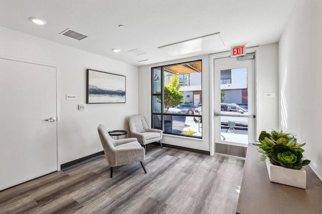 living area featuring hardwood / wood-style floors