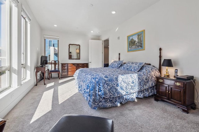 bedroom with light carpet