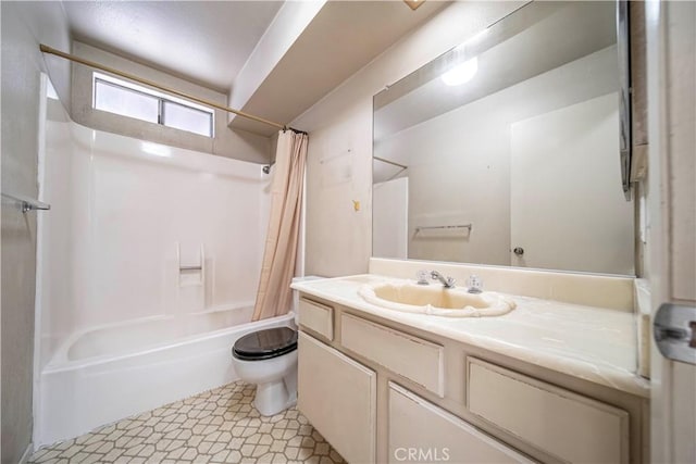 full bathroom with toilet, shower / tub combo, and vanity