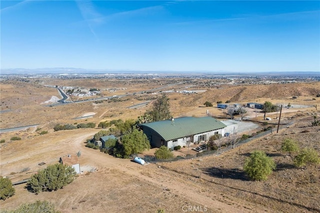 birds eye view of property with a rural view