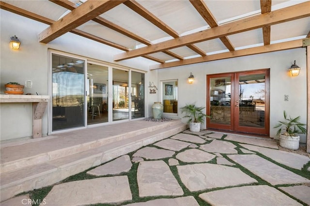 view of patio / terrace featuring a pergola and french doors