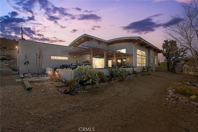 exterior space featuring a pergola