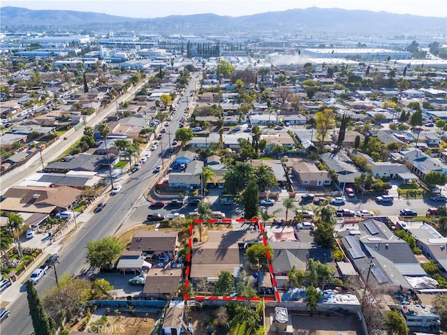 drone / aerial view featuring a mountain view