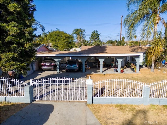 single story home with a carport