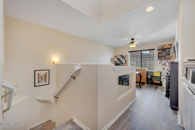 interior space featuring ceiling fan and hardwood / wood-style floors