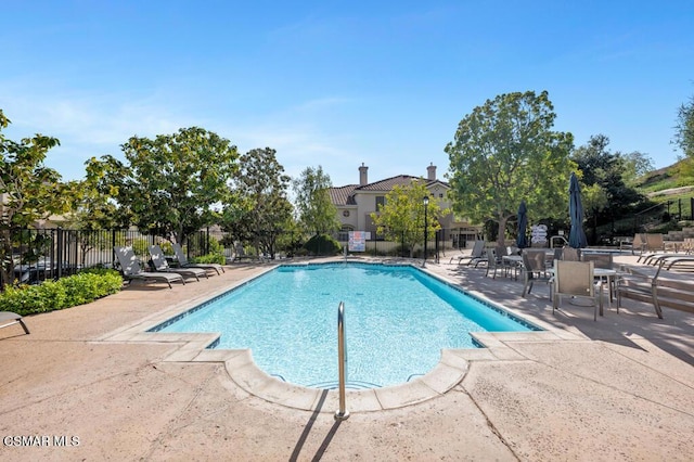 view of pool with a patio area