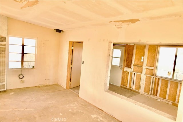 unfurnished room with plenty of natural light