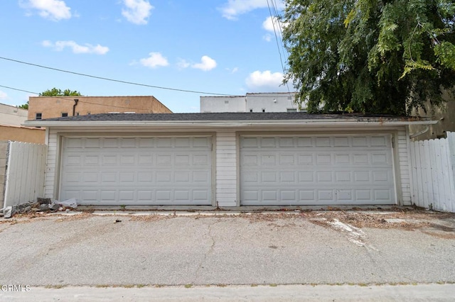 detached garage with fence