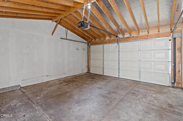 garage featuring a garage door opener