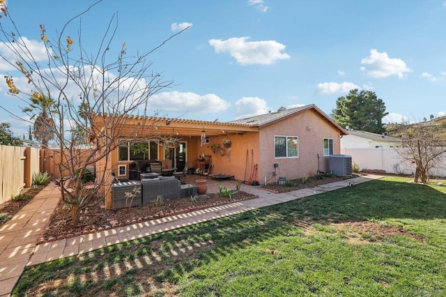 back of house with central AC, a yard, an outdoor living space, and a patio