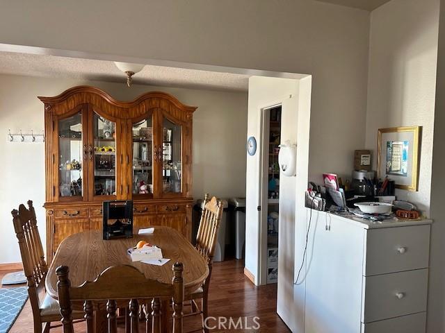 dining room with wood finished floors