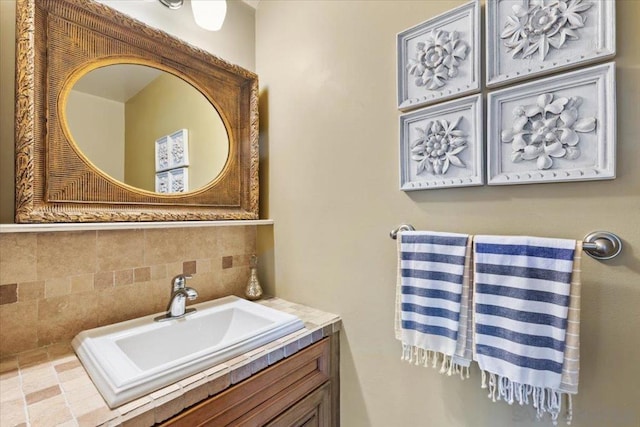 bathroom featuring backsplash and vanity