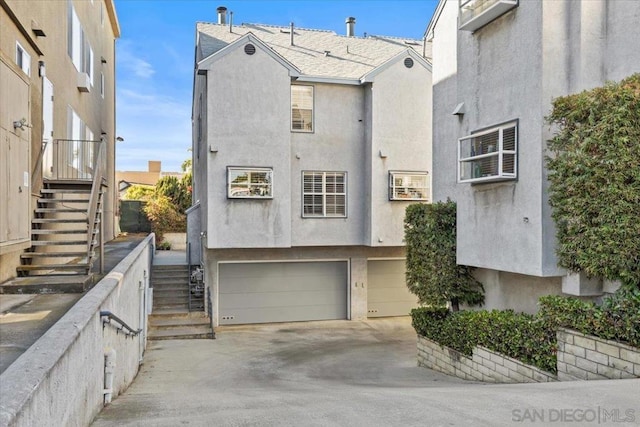 view of front of property with a garage