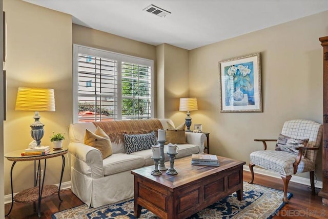 living room featuring dark wood-type flooring