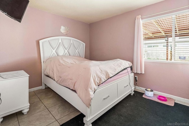 bedroom with tile patterned flooring