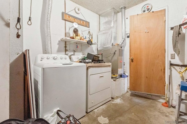 washroom featuring washing machine and dryer