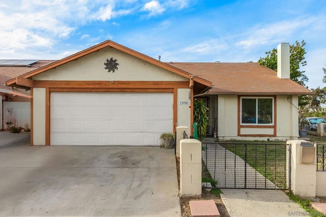 single story home featuring a garage