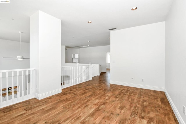 spare room with wood-type flooring