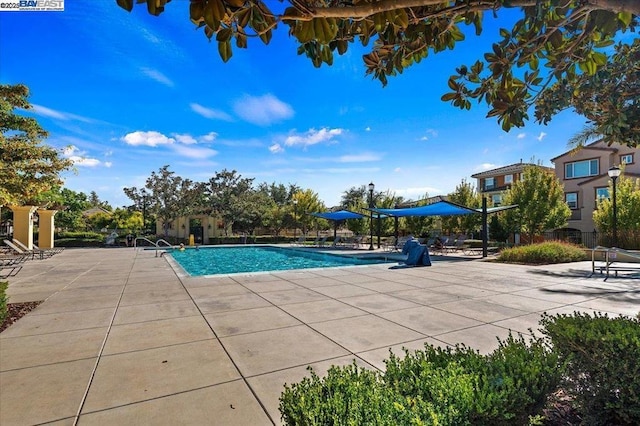 view of pool featuring a patio area