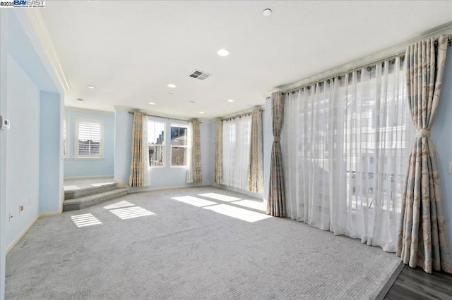 empty room featuring carpet flooring