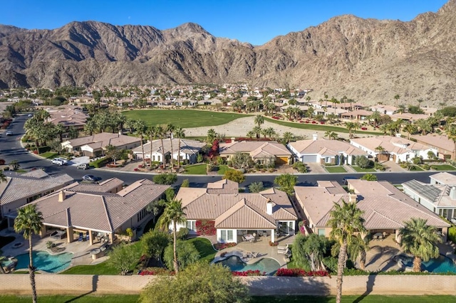 drone / aerial view featuring a mountain view