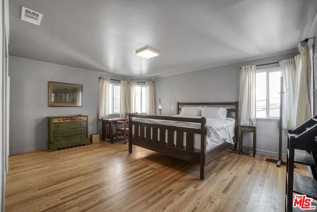 bedroom featuring light hardwood / wood-style flooring