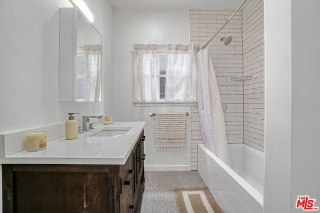 bathroom featuring shower / bathtub combination with curtain and vanity