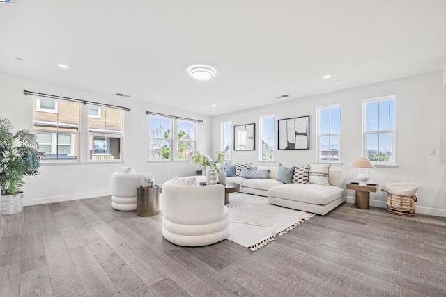 living room with light hardwood / wood-style floors