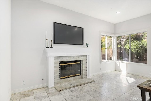 unfurnished living room with a fireplace