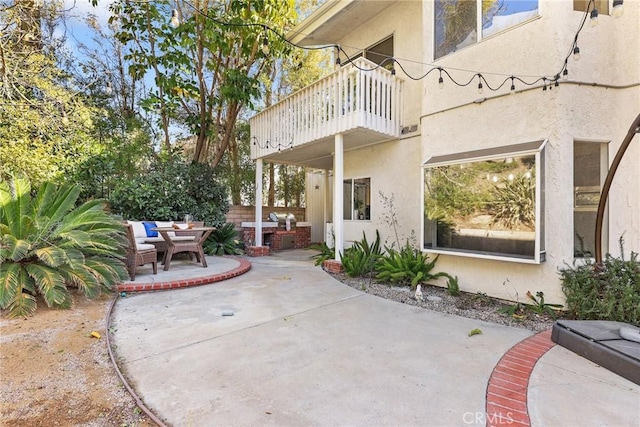 view of patio / terrace featuring a balcony