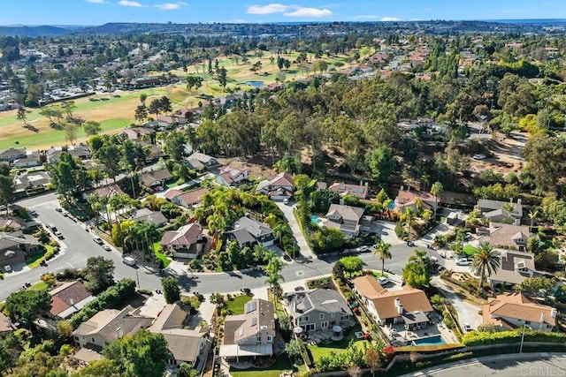 birds eye view of property with a residential view