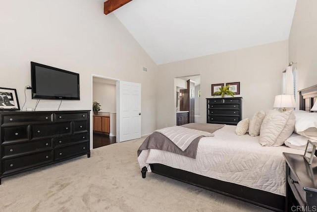 bedroom featuring visible vents, ensuite bathroom, carpet, high vaulted ceiling, and beam ceiling