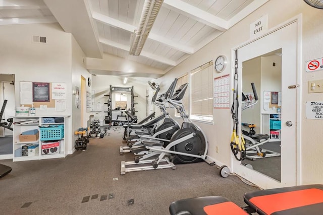 exercise room with lofted ceiling