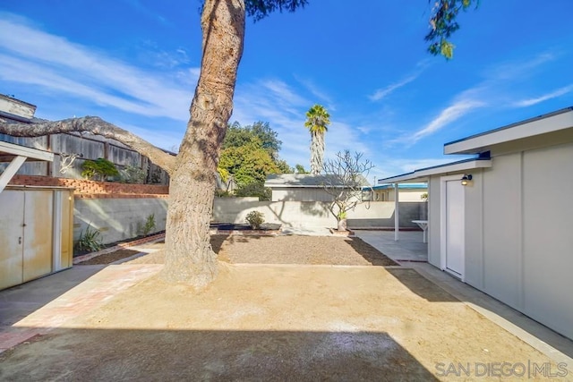 view of yard with a patio area