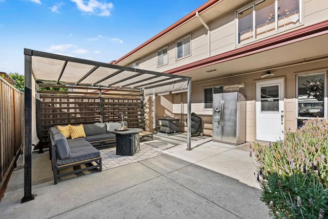 view of patio / terrace featuring an outdoor living space and a pergola