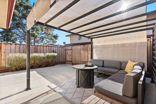 view of patio with an outdoor living space and a pergola