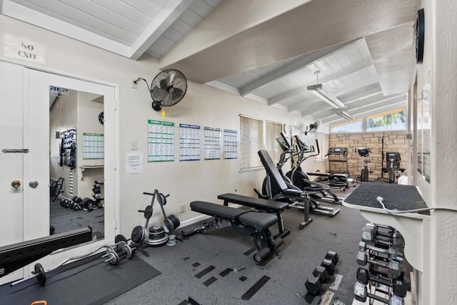 workout area featuring vaulted ceiling