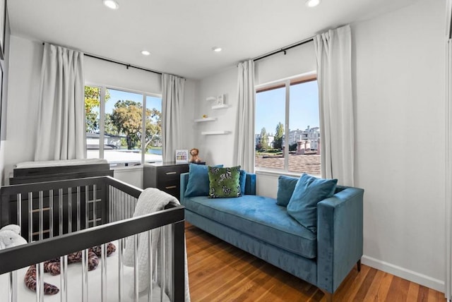 bedroom featuring hardwood / wood-style flooring