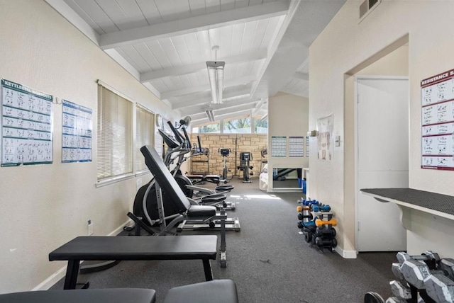 workout room featuring lofted ceiling