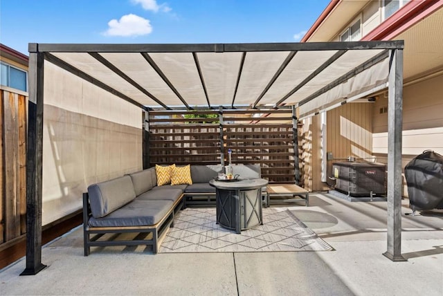 view of patio with an outdoor living space and a pergola