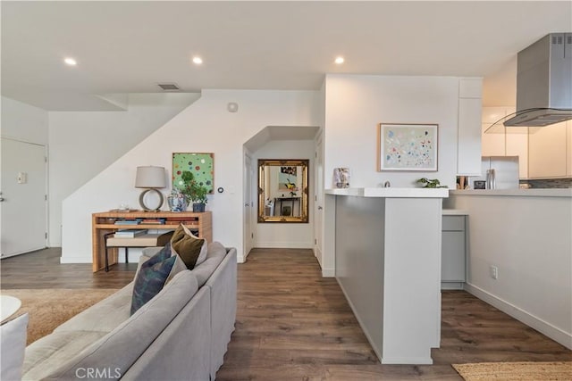 living room with dark hardwood / wood-style floors