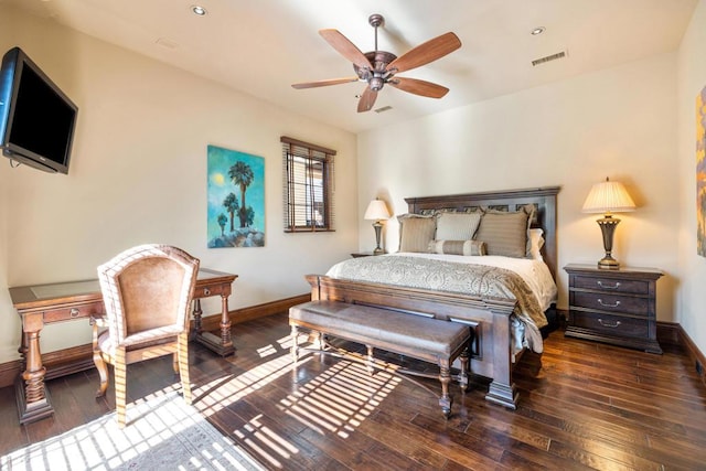 bedroom with ceiling fan and dark hardwood / wood-style floors