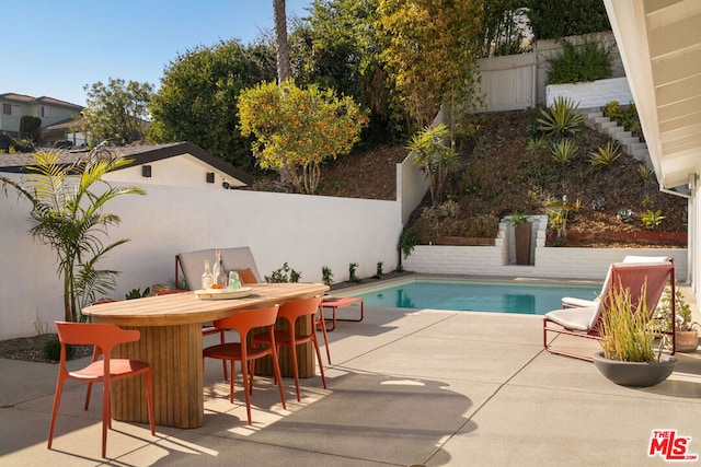 view of pool with a patio