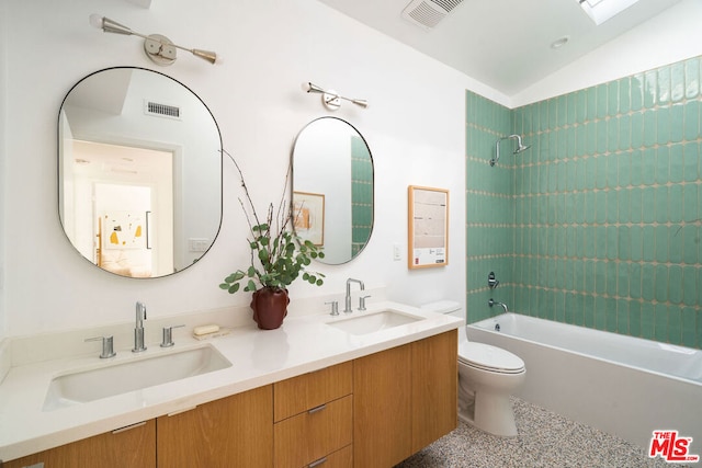 full bathroom with toilet, bathtub / shower combination, lofted ceiling, and vanity