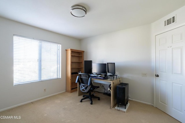 home office with light colored carpet